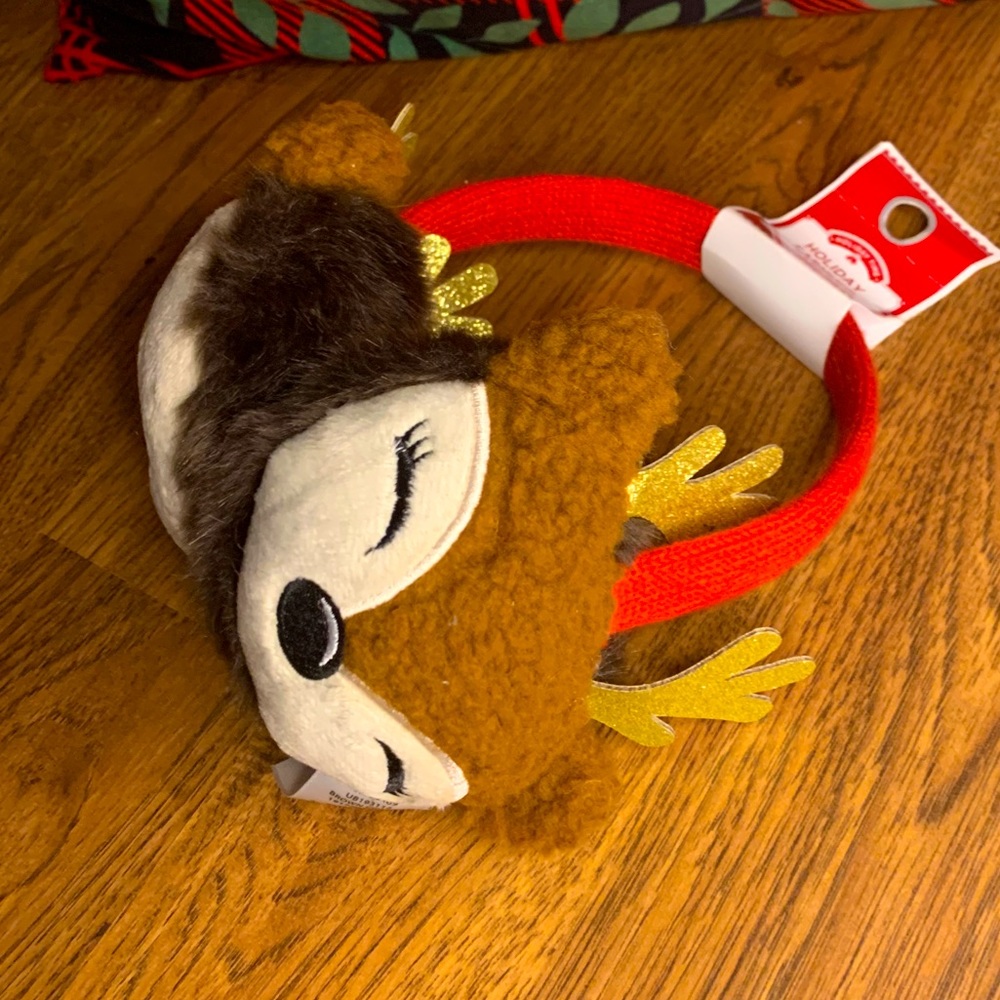 Holiday earmuff . New.